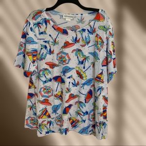 Short sleeve beach themed print blouse with silver sparkles